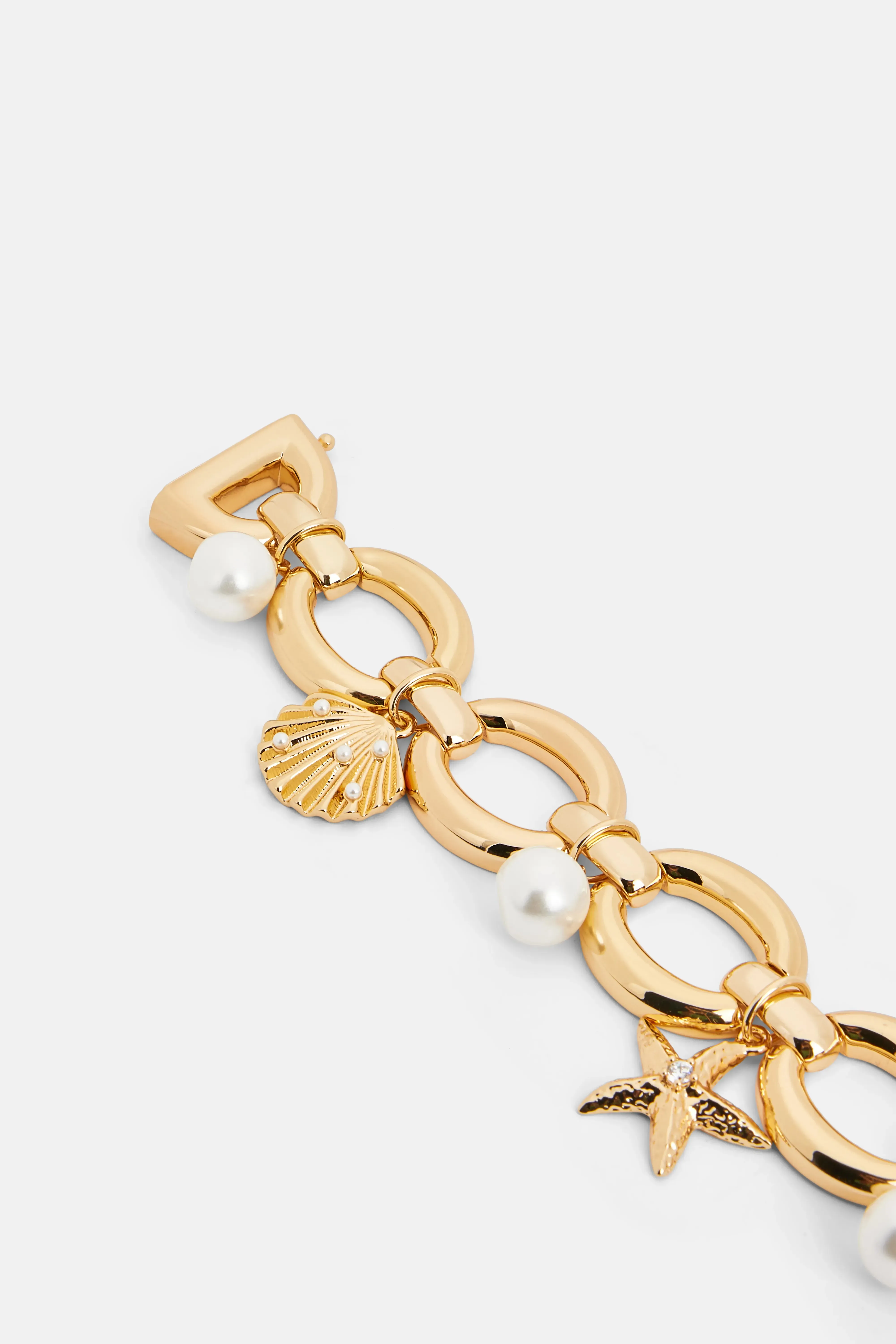 Pearl Shell Charms Bracelet in Gold